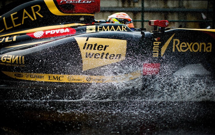 Pastor Maldonado's Lotus Formula 1 car splashing water