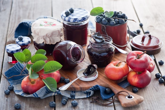 Jars of Jam with Blueberries and Apples