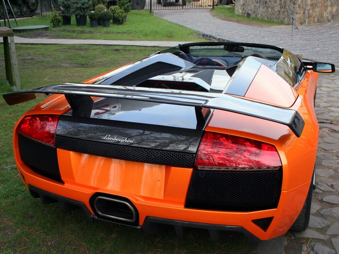 Orange Lamborghini Murcielago Roadster from behind