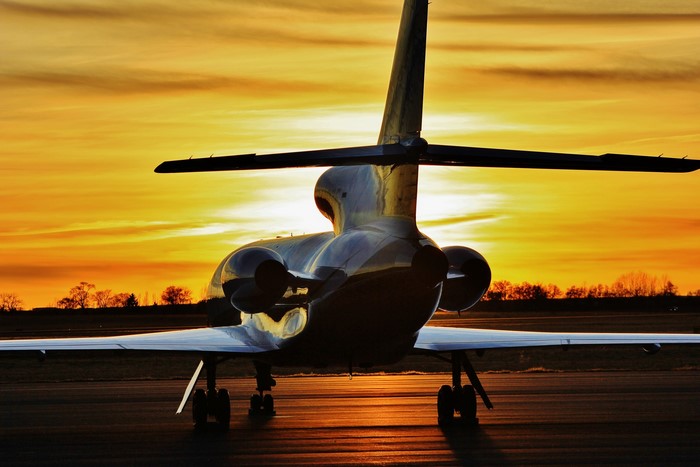 Dassault Falcon 900 airplane at sunset