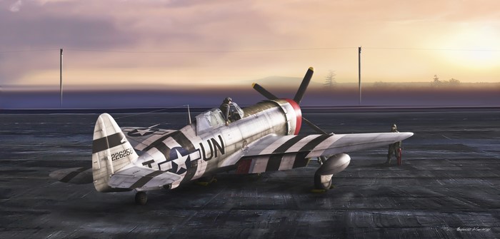 P-47 Thunderbolt airplane on tarmac at sunrise