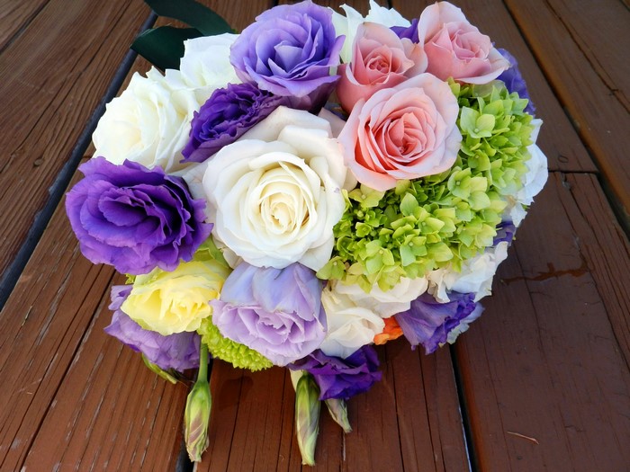 Wedding bouquet with roses, hydrangea, and eustoma