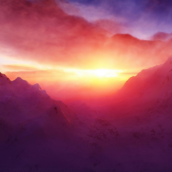 Sunset over snow-covered mountains