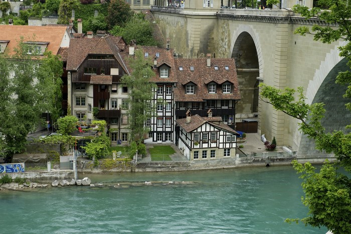 Houses by the river with a bridge in Bern, Switzerland