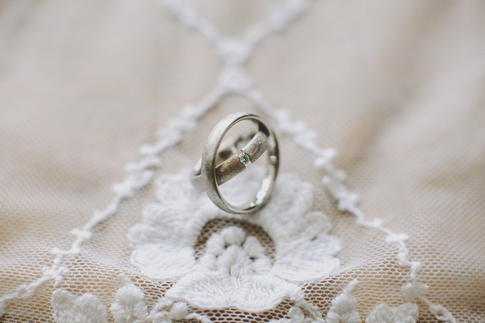 Two wedding rings on lace