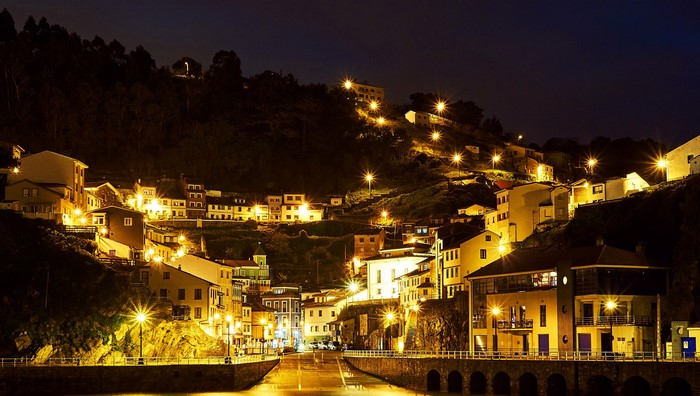 Cudillero, Spain at night with street lights