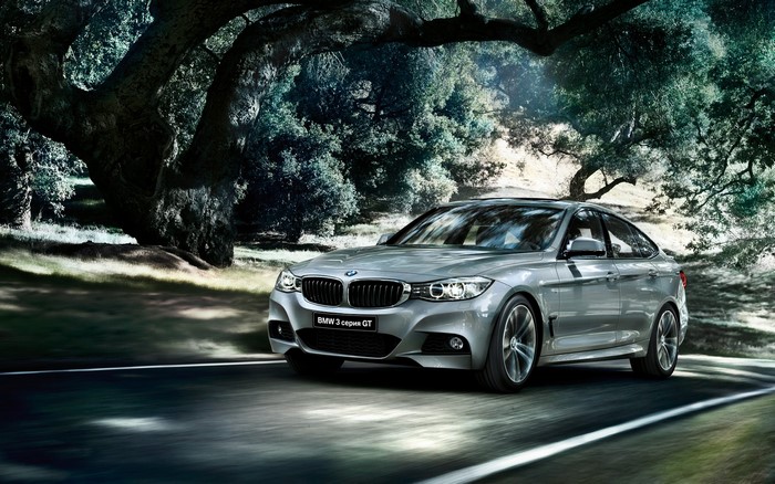 Silver BMW 3 Series Gran Turismo GT driving on a road