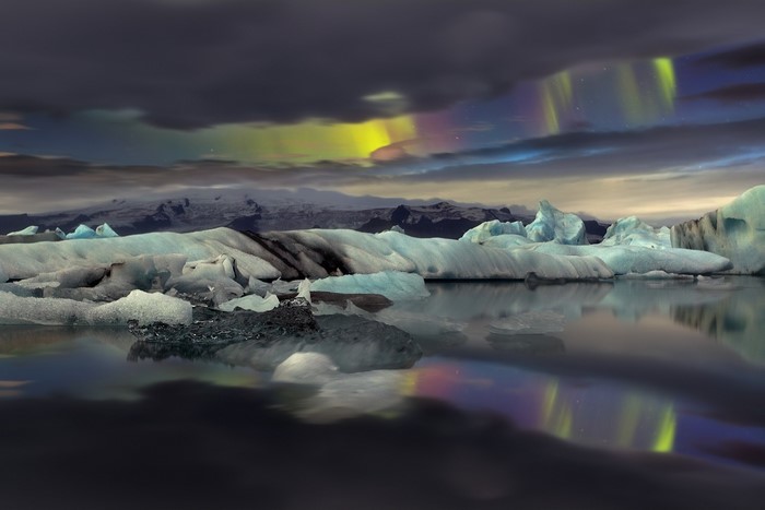 Aurora Borealis over Icebergs in a Lake