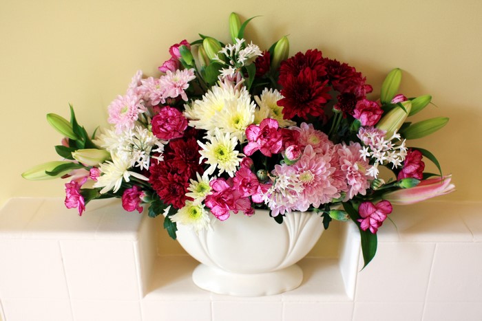 Floral arrangement of chrysanthemums and carnations in a vase