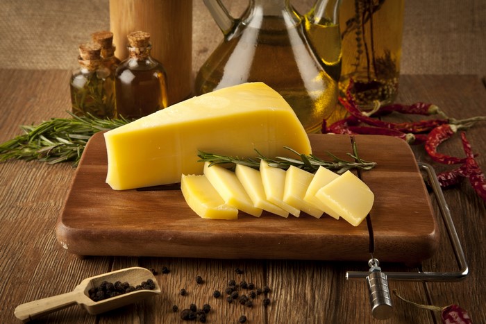 Cheese with spices and olive oil
