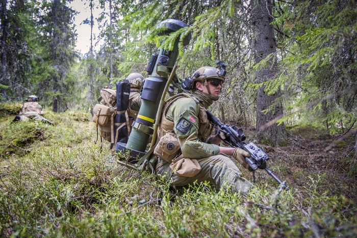 Norwegian soldiers with Javelin missile launcher in forest
