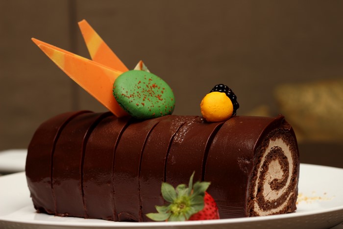 Chocolate Swiss Roll Cake with Fruit and Macaron
