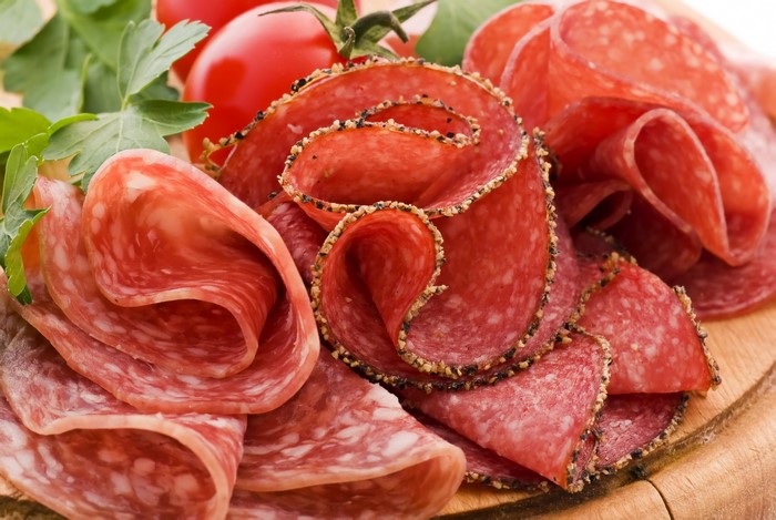 Slices of Salami and Cherry Tomatoes