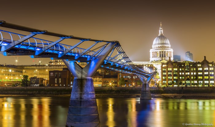 Millennium Bridge and St. Paul's Cathedral at night, London