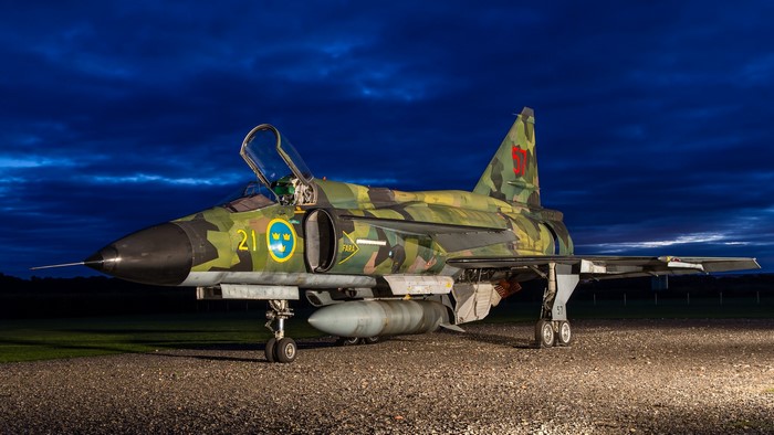 SAAB JAS 39 Gripen fighter jet at night