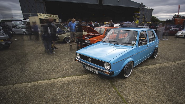 Light Blue Volkswagen Golf at a Car Show