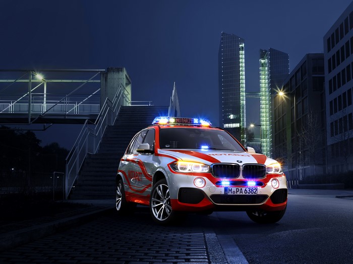 BMW X5 Notarzt emergency vehicle at night