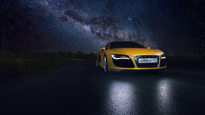 Yellow Audi R8 Supercar under the Milky Way