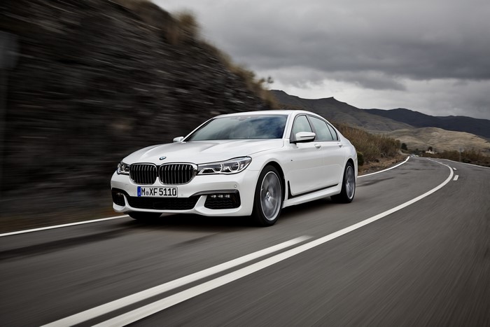 White BMW 7 Series G11/G12 driving on a road