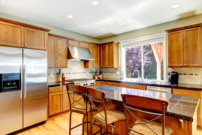 Modern kitchen with wooden cabinets and island