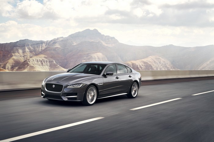2015 Jaguar XF driving on a mountain road