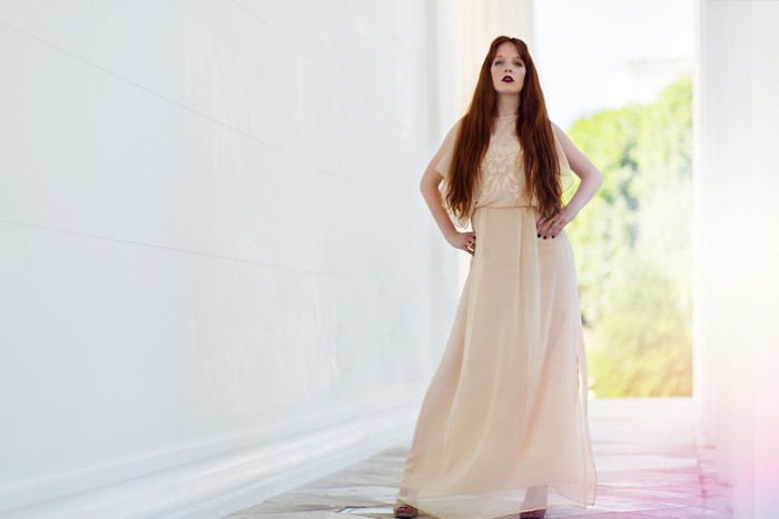 Redhead girl in a dress
