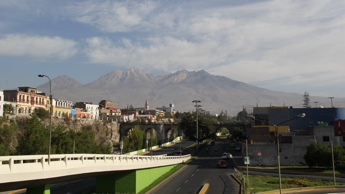 Cityscape with Mountains and Bridges