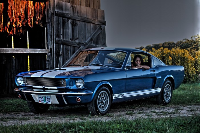 1966 Ford Mustang Shelby GT350 with woman