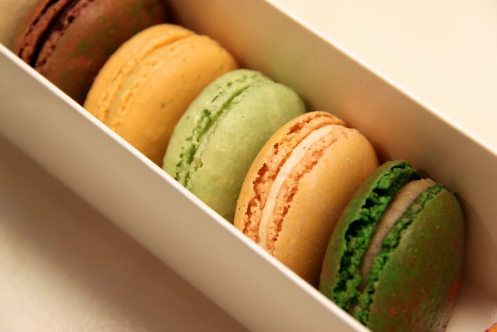 Assortment of colorful macarons in a box