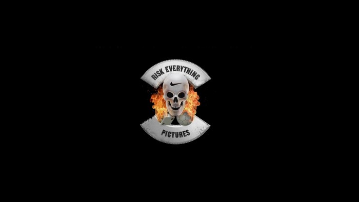 Risk Everything Pictures logo with skull and soccer ball