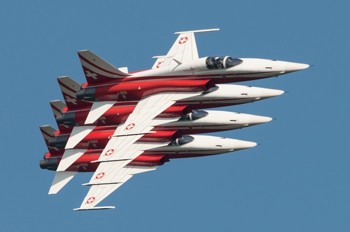 Four Swiss F-5E Tiger II fighter jets in formation