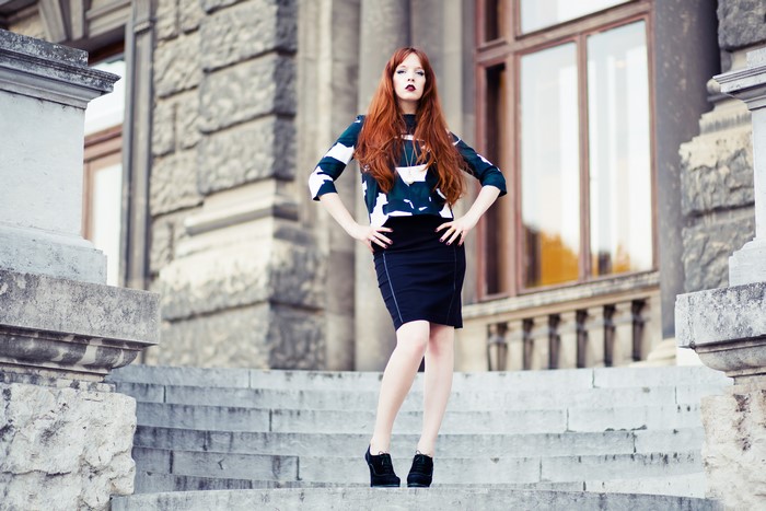 Redhead girl on stairs