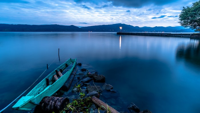 Boat on Lake Toba, Sumatra, Indonesia at Dusk