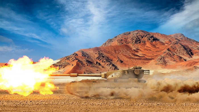 FV215b tank firing in a desert landscape
