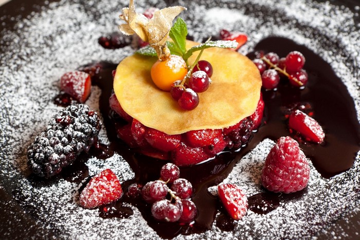 Dessert with berries and pancake