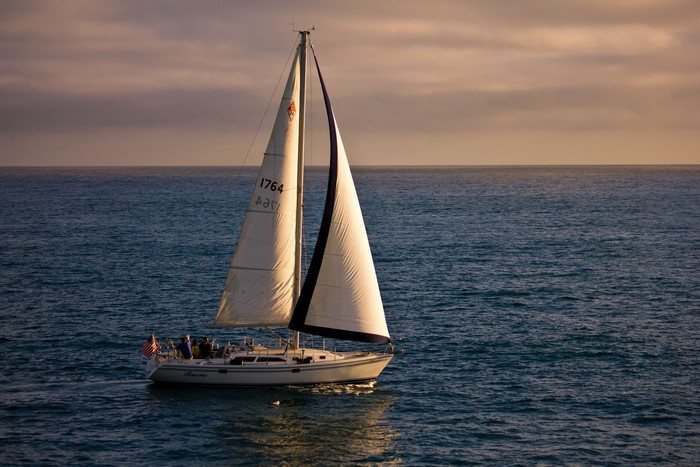 Sailboat on the Pacific Ocean at sunset