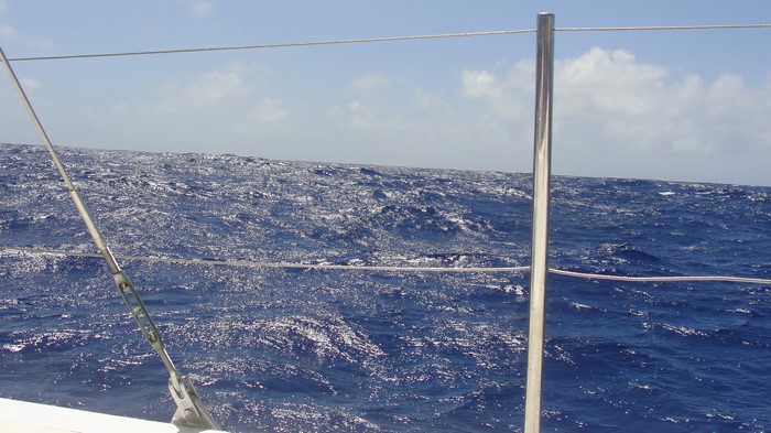 Rough sea with waves and clouds