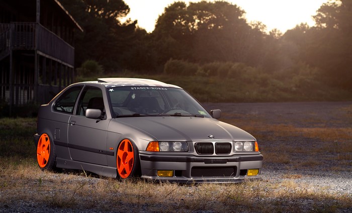 Grey BMW E36 with orange wheels