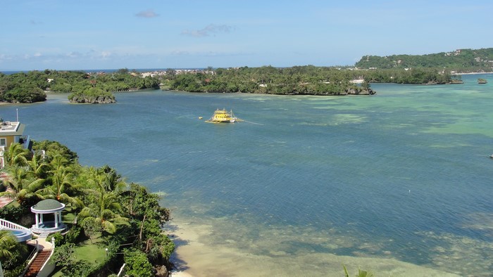 Boracay Coastline with Tropical Islands and Yellow Boat