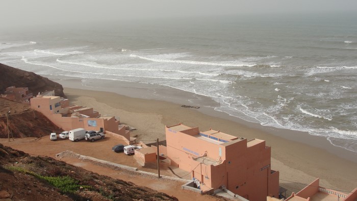 Coastal village with houses and the sea in Morocco