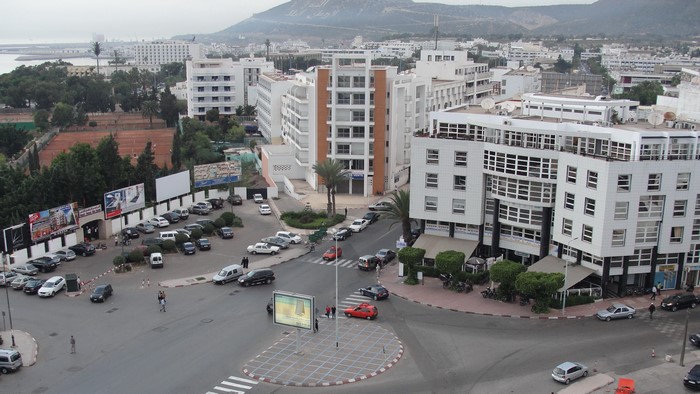 Agadir, Morocco street view with buildings and cars