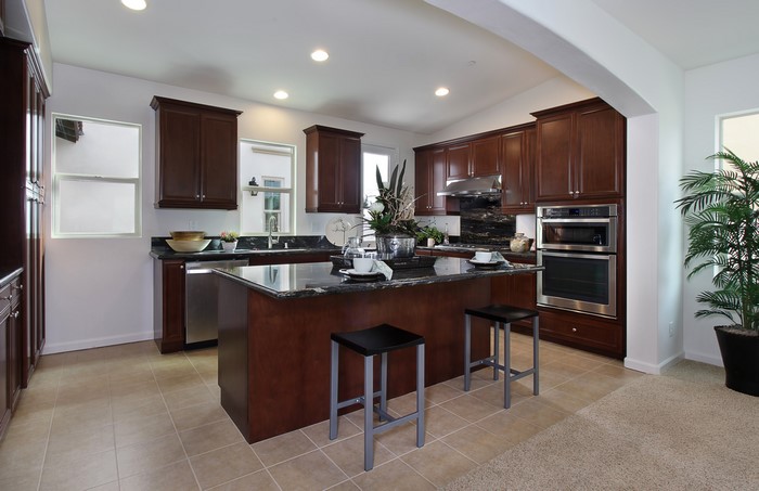 Modern Kitchen with Dark Wood Cabinets and Island
