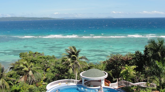 Tropical Resort Pool Overlooking the Ocean in Boracay, Philippines