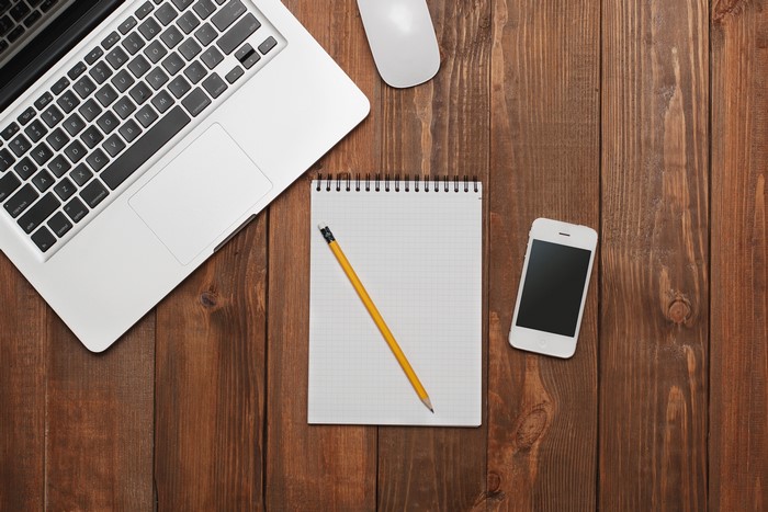 4K Apple Macbook, Mouse, Notebook, Pencil, and Smartphone