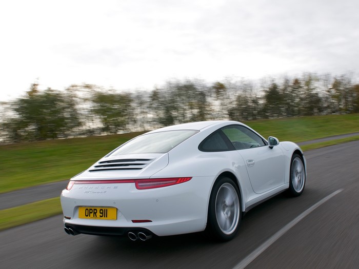 White Porsche 911 Carrera 4 from behind