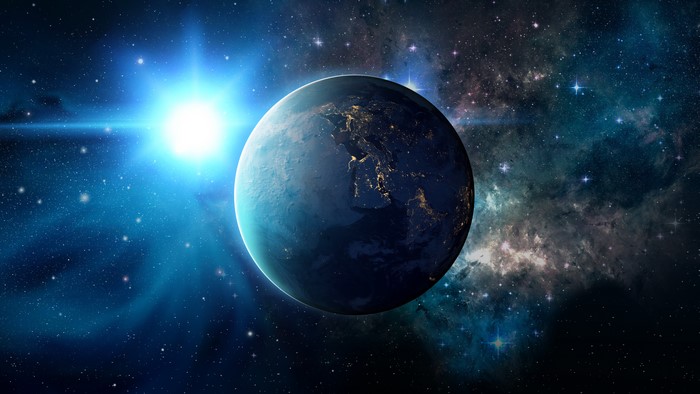 Planet Earth in Space with Sun and Nebula