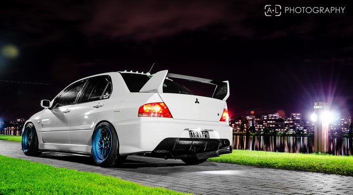 White Mitsubishi Lancer Evolution at Night