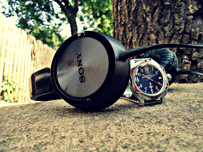 Sony Headphones and Vostok Watch on Ground