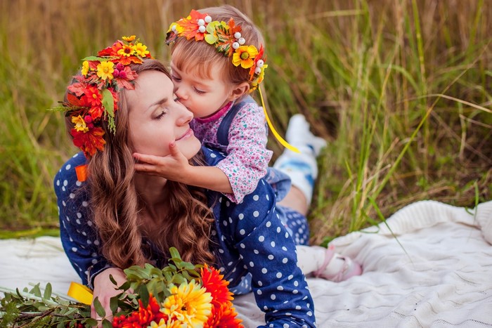 Mother and daughter with flower crowns
