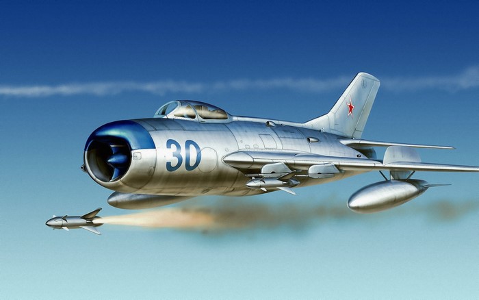 Mikoyan-Gurevich MiG-17 fighter jet firing a missile